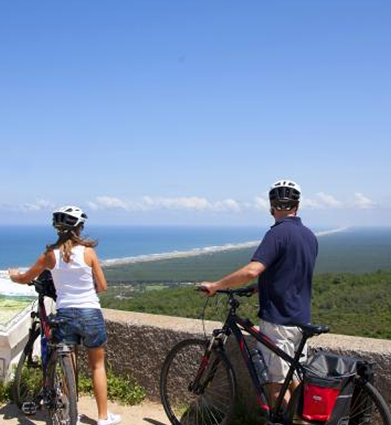 Cyclists enjoying stunning coastal views